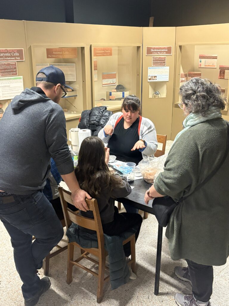 LodgePole staff member, Danielle, explaining how to make seed balls